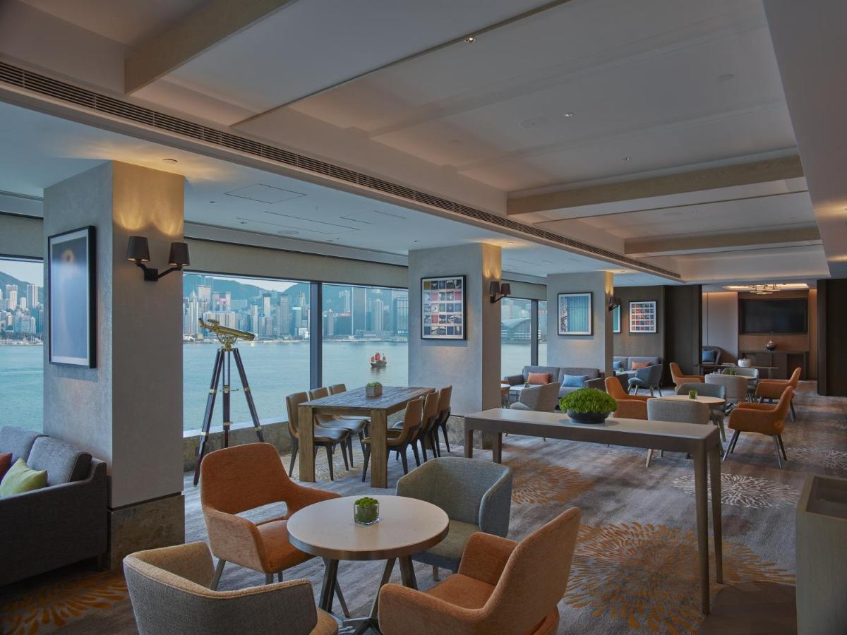 New World Millennium Hong Kong Hotel Экстерьер фото The Club lounge at Hong Kong International Airport